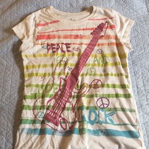A White Guitar T-Shirt With Rainbow Stripes